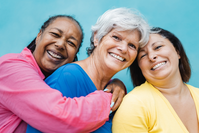 three older woman smiling